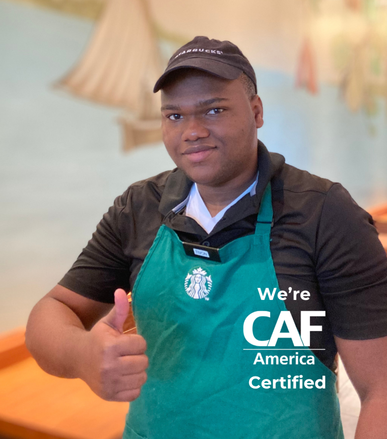 Inclusion Cayman Employee with CAF certified logo overlay