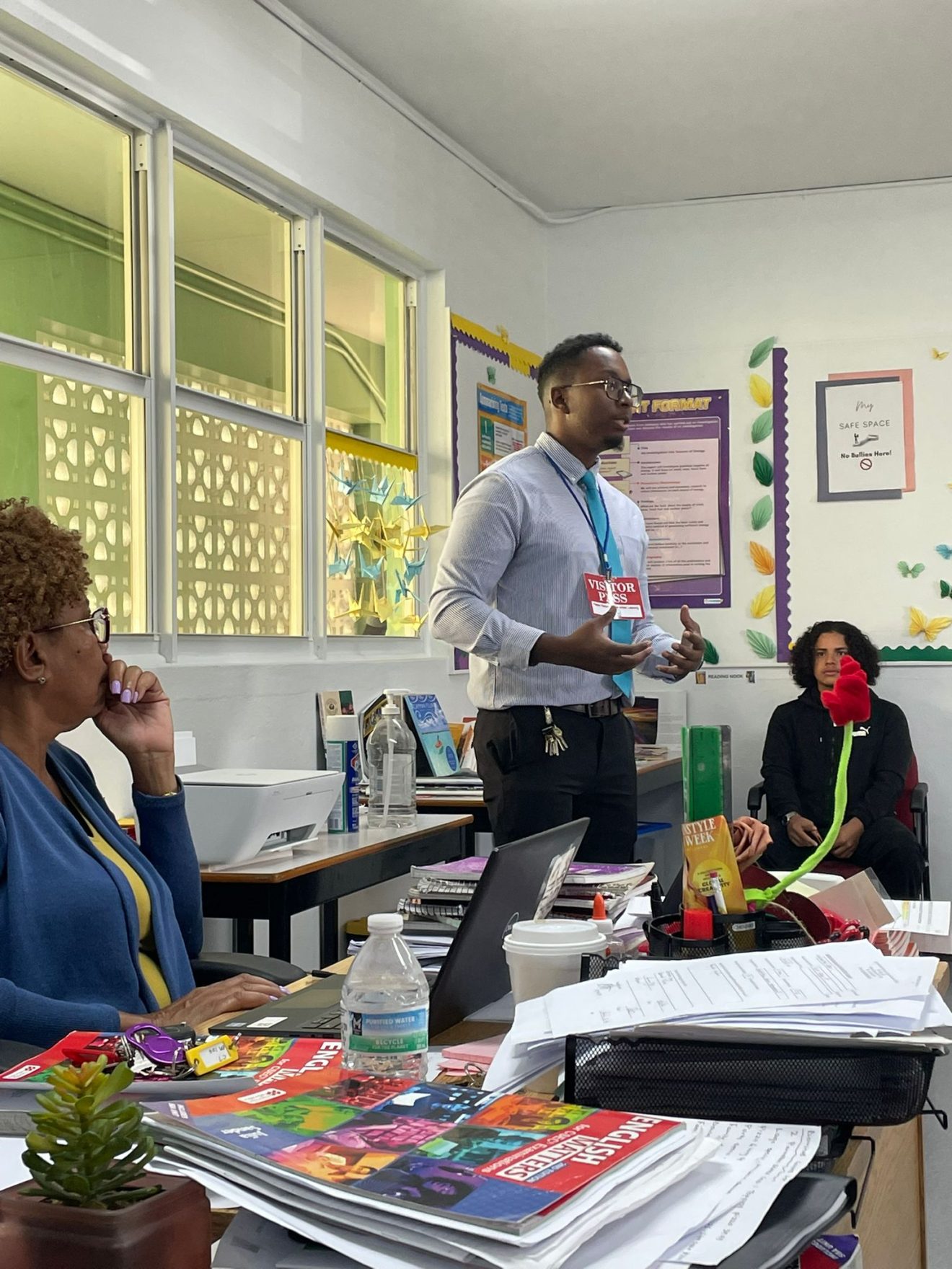 Nathan Chesney presenting at Primary school standing at front of classroom